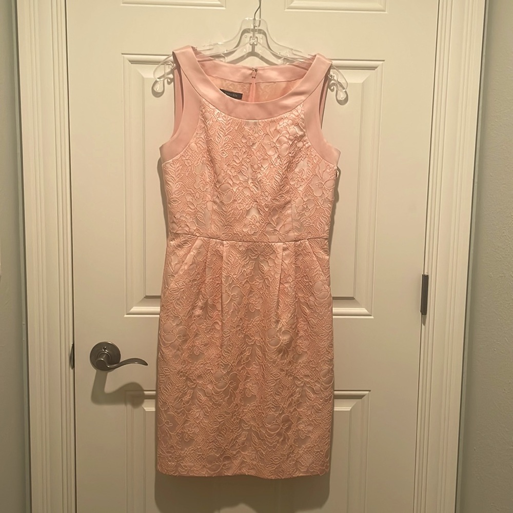Peach sleeveless dress.